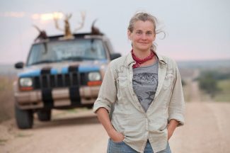 Woman In Front of Jeep